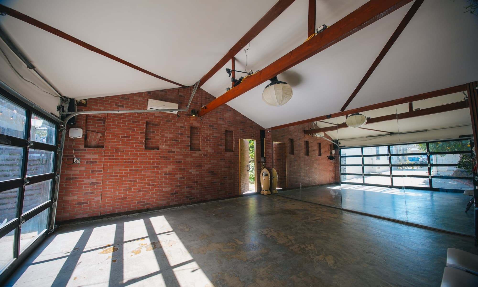 Exposed Brick + Mirrors